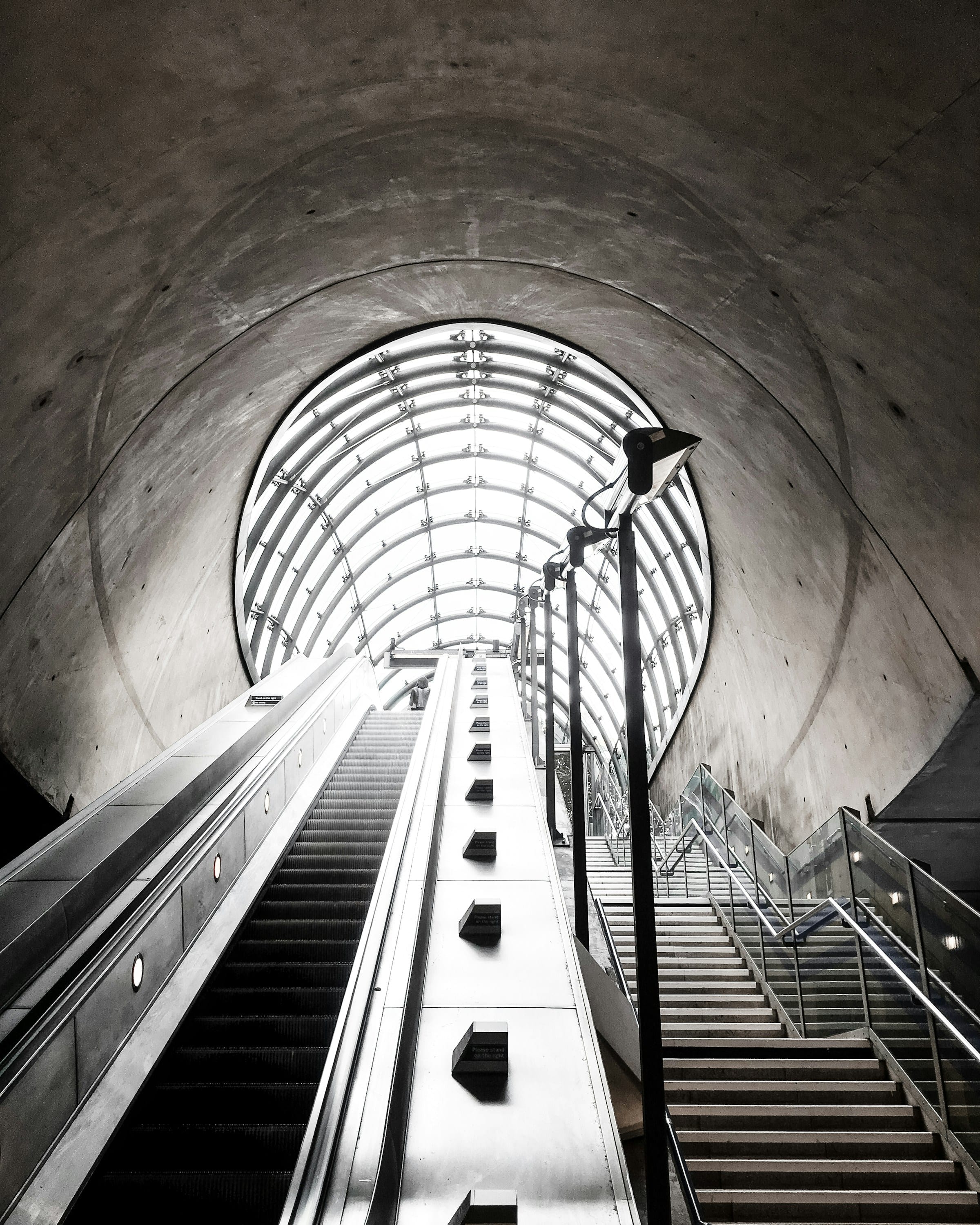 Glass-arched building interior looking upward